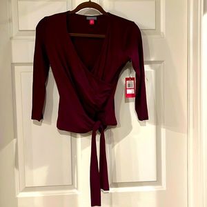 NWT Vince Camuto burgundy faux wrap top with tie.